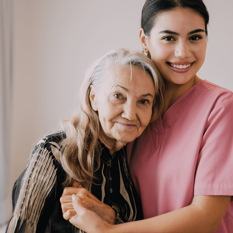 elderly woman with caregiver