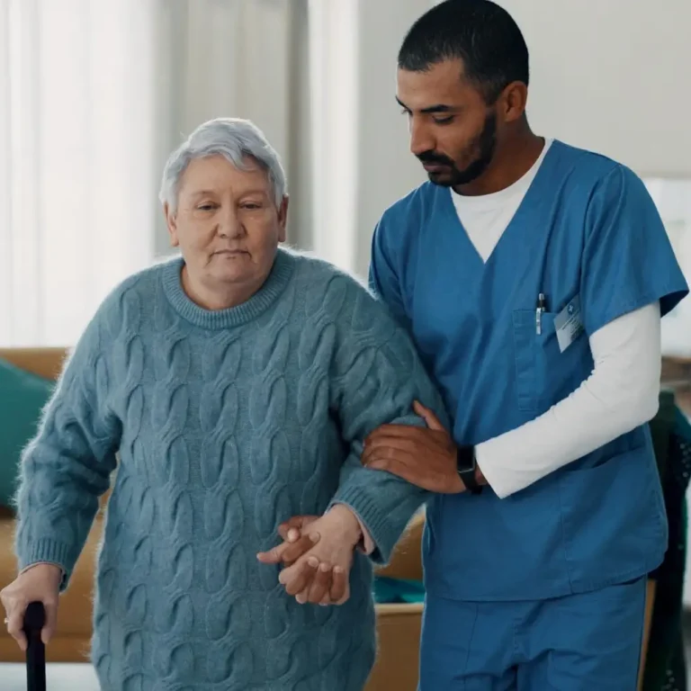 Senior woman, nurse and walking stick for support at a nursing home in retirement. Elderly female p.